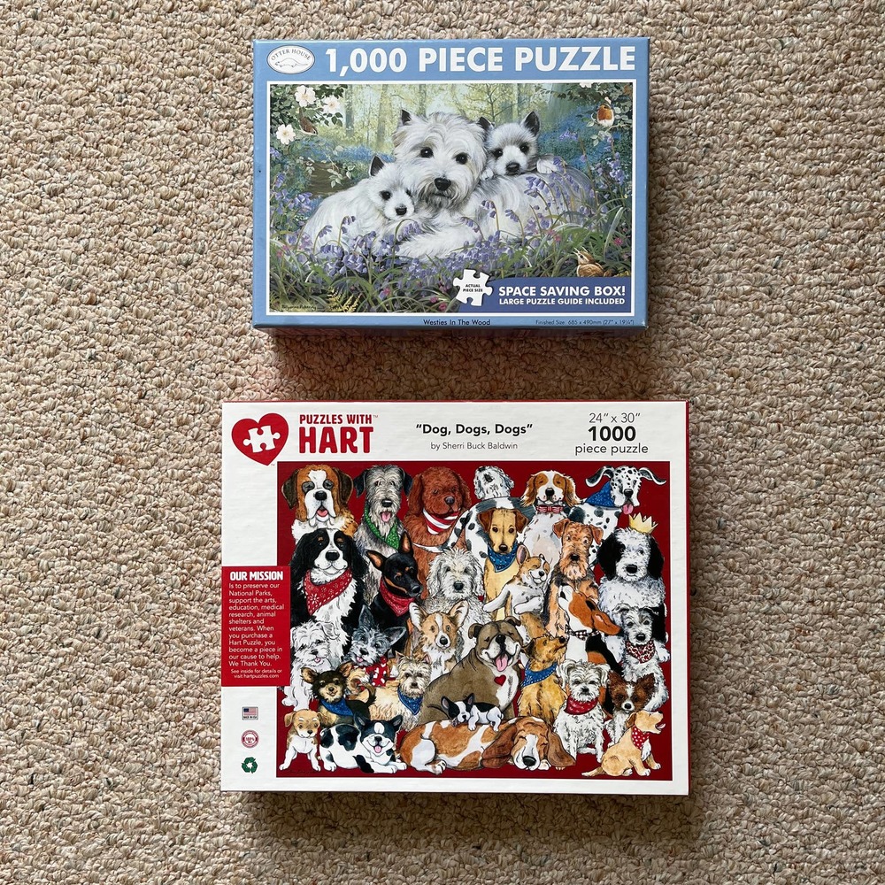 Lot of two 1,000 piece puzzles for dog lovers. GUC